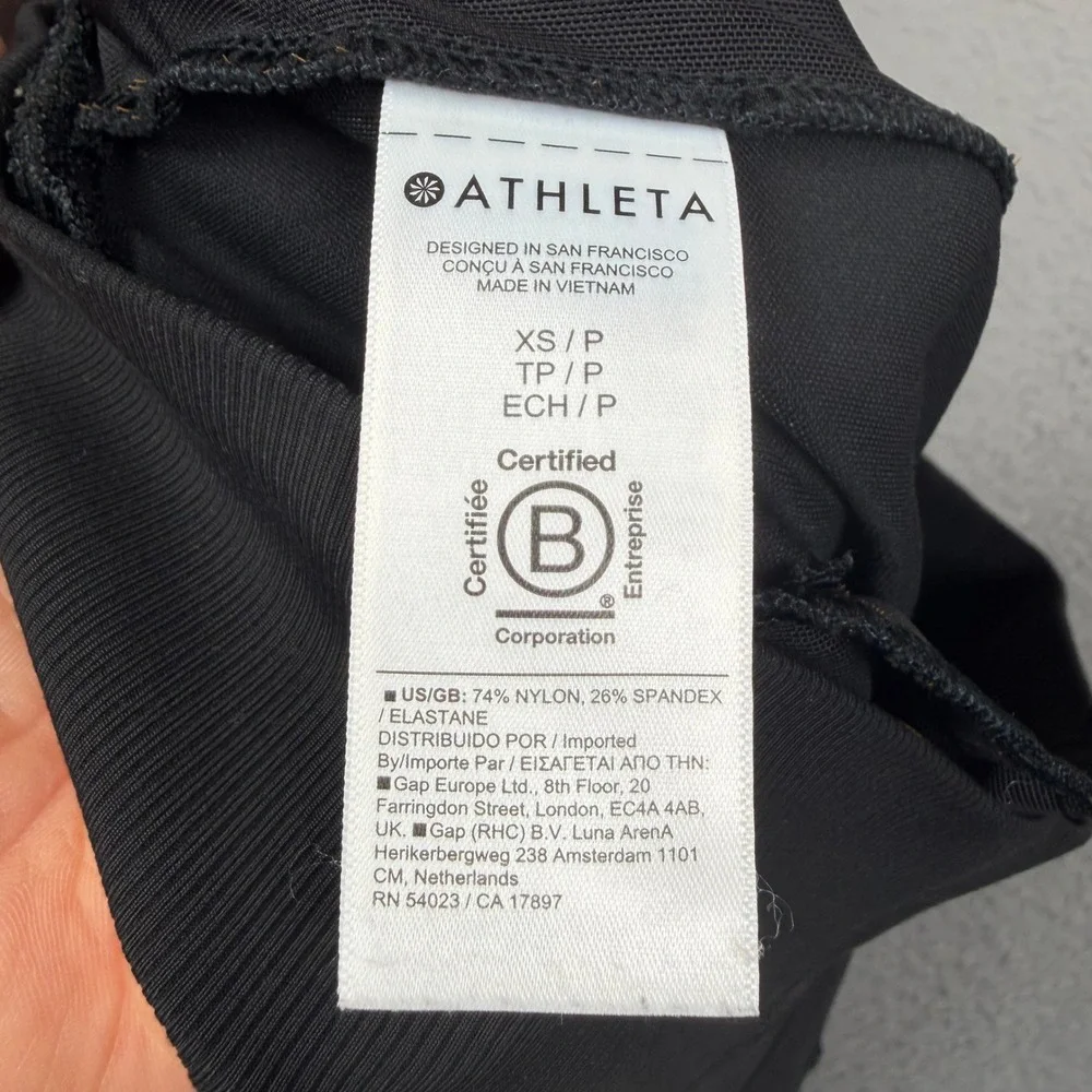 Athleta Womens Black High Rise Flare Bootcut Pants Zip‎ Pockets Slit Hem XS